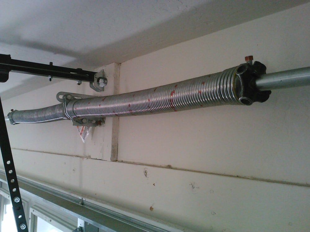 4 Steps to Replacing Broken Garage Door Springs - Overhead Garage Door Jacksonville